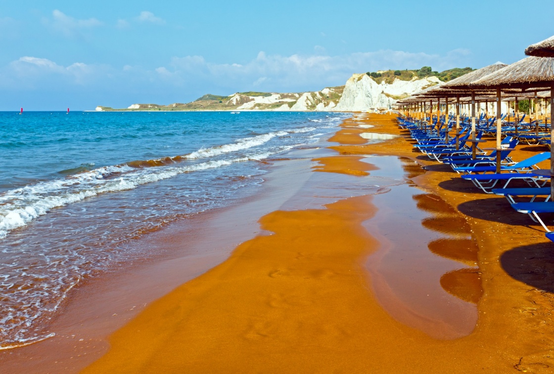 Xi Beach with orange sand. Morning view (Greece, Kefalonia). Ionian Sea.